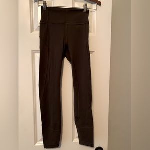 Lululemon Dark Olive “In Movement” 25” leggings size 4